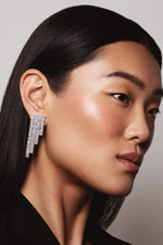 Load image into Gallery viewer, Model wearing Art Deco cushion cut lab grown diamond earrings in platinum by Victoire