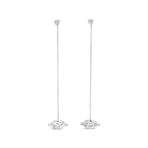 Le Kiss pendant earrings featuring kiss shape lab grown diamonds on long white gold chains.