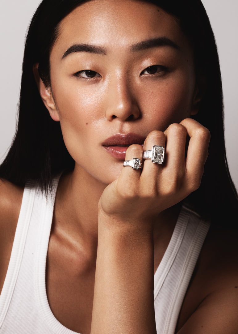 model wearing art deco collection ring with radiant and baguettes lab grown diamonds by Victoire