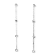 Les Classiques collection featuring the Nina long pendant earrings with 8 lab-grown diamonds on white gold chain by Victoire