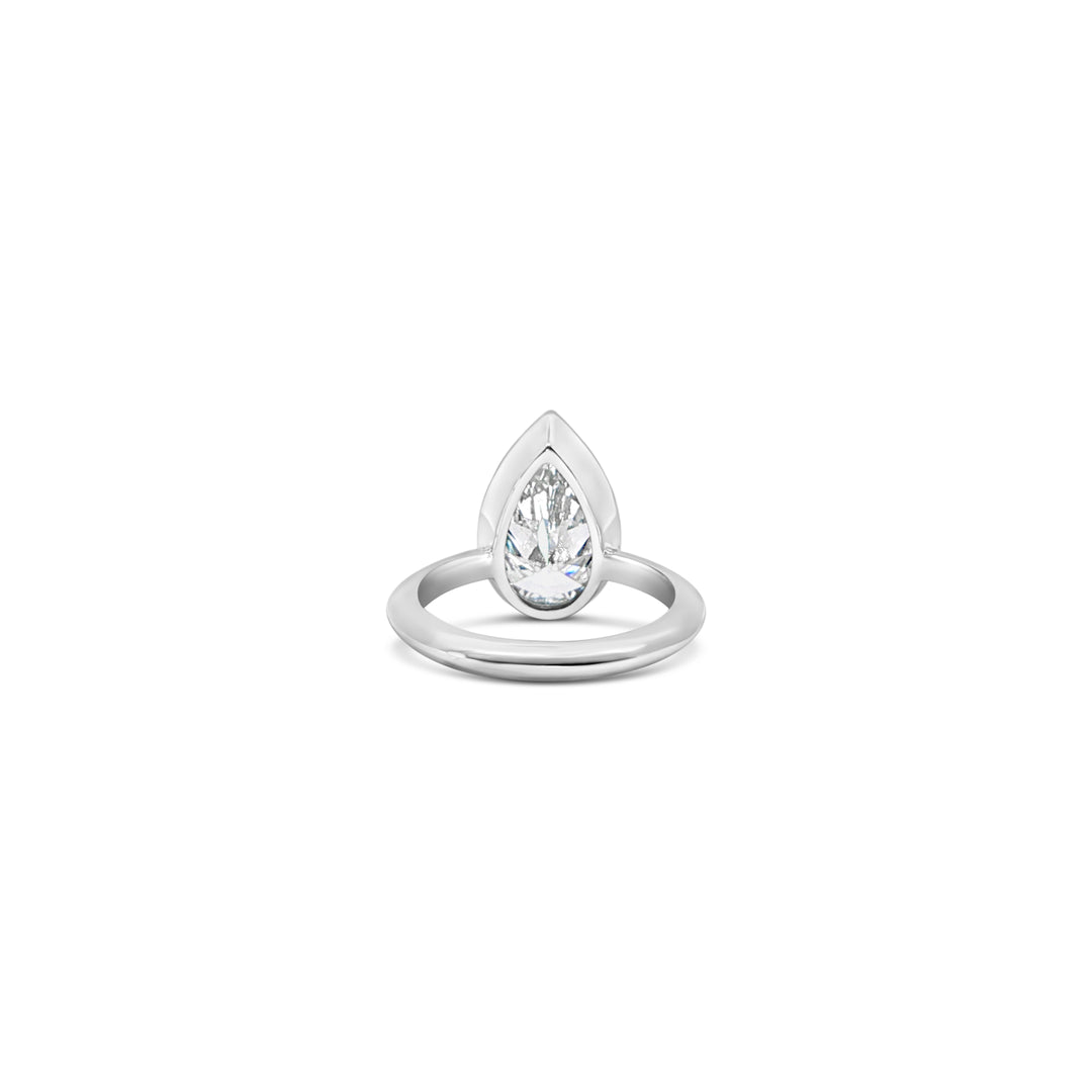 Angle of Les Pinky Collection pear lab grown diamond ring in platinum by Victoire