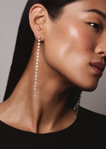 Load image into Gallery viewer, Model wearing Sequence collection tennis style long earrings with lab grown diamonds on platinum by Victoire